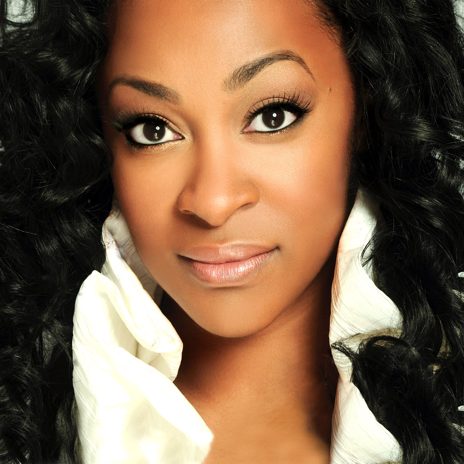 Portrait of Jessica Reedy wearing a white collared blouse
